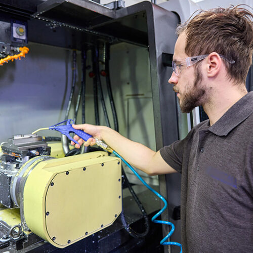 Samuel at work on the CNC milling machine, 2025